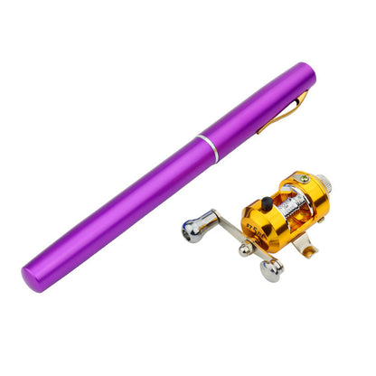 Purple pen and gold fishing reel on a white background