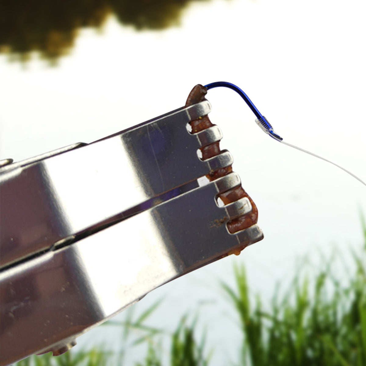 Fishing tackle showing the worm bait clip for easy bait attachment